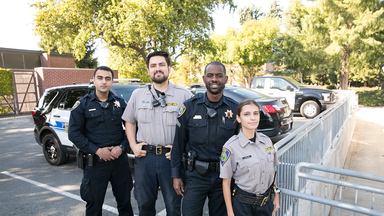 Officers and student cadets outside the DVC Police headquarters.