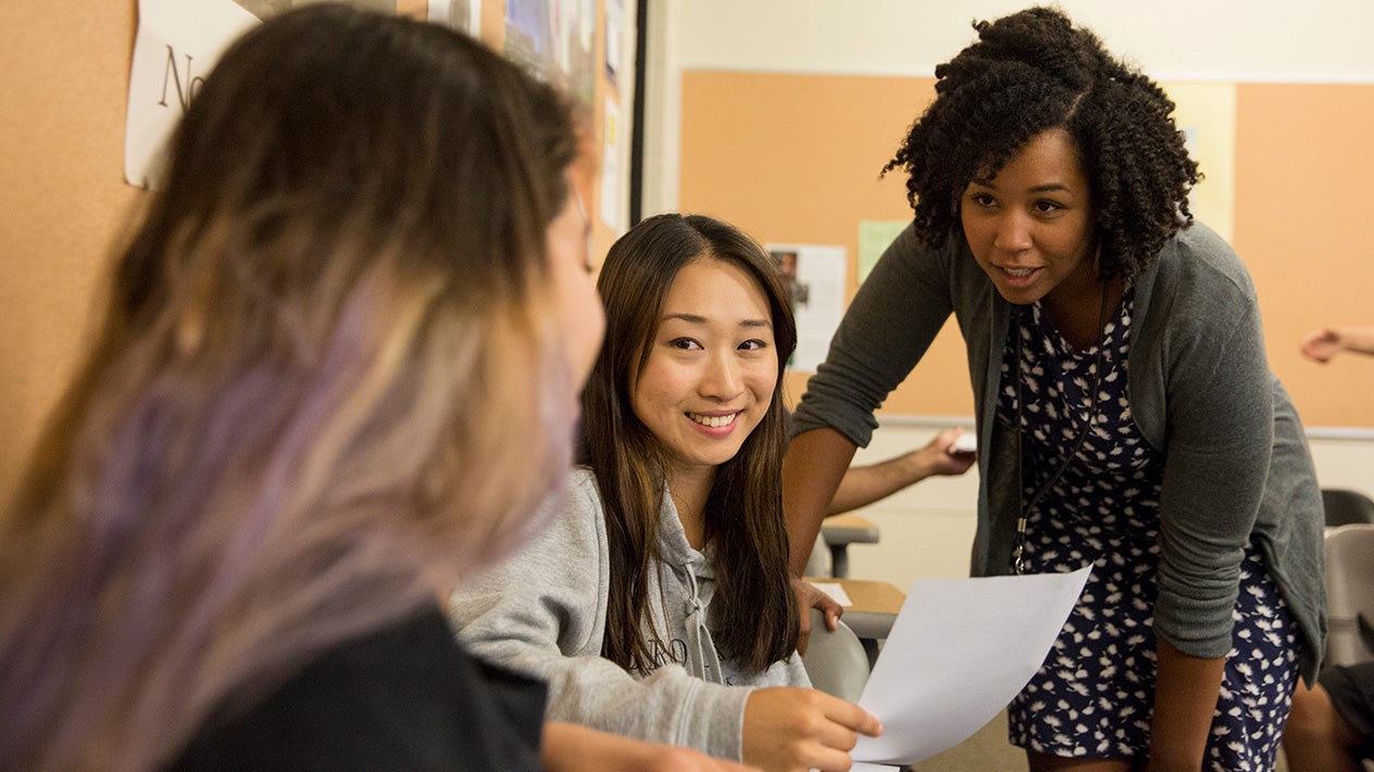 A DVC counselor works with students.