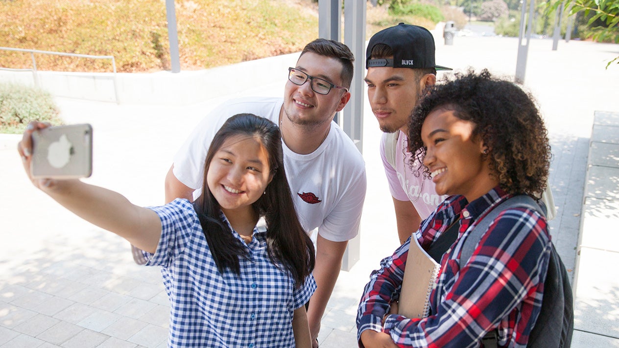 DVC students take a group selfie.