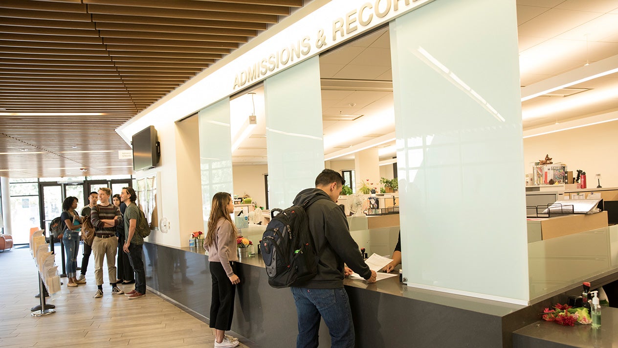 Students in the DVC Admissions & Records office.