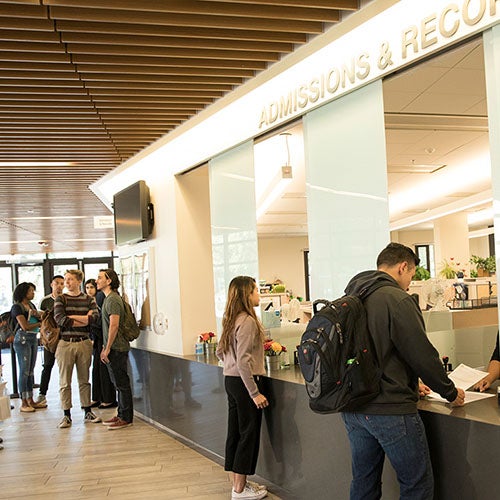 Students in the DVC Admissions & Records office.