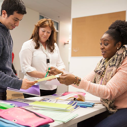 A DVC student works with Financial Aid counselors.