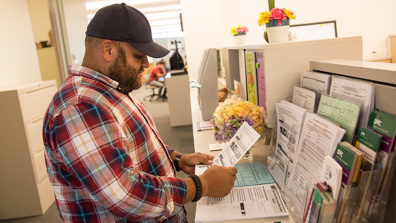 A DVC student in the Student Services building.