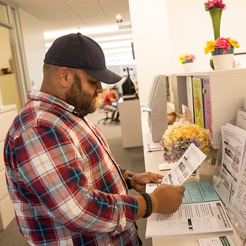 A DVC student in the Student Services building.