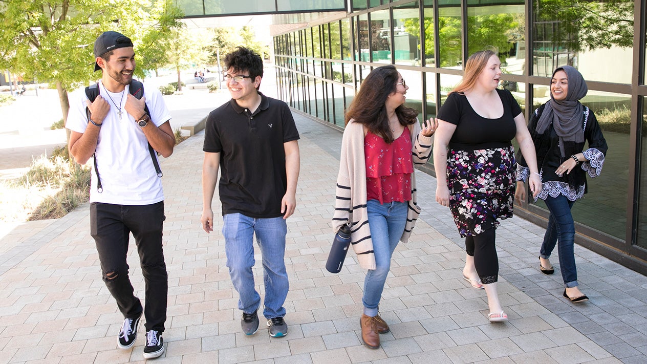 DVC students walking in the Commons.