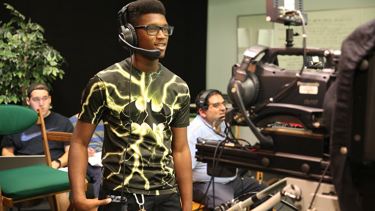 A Film, Television and Electronic Media (FTVE) student at work at DVC.