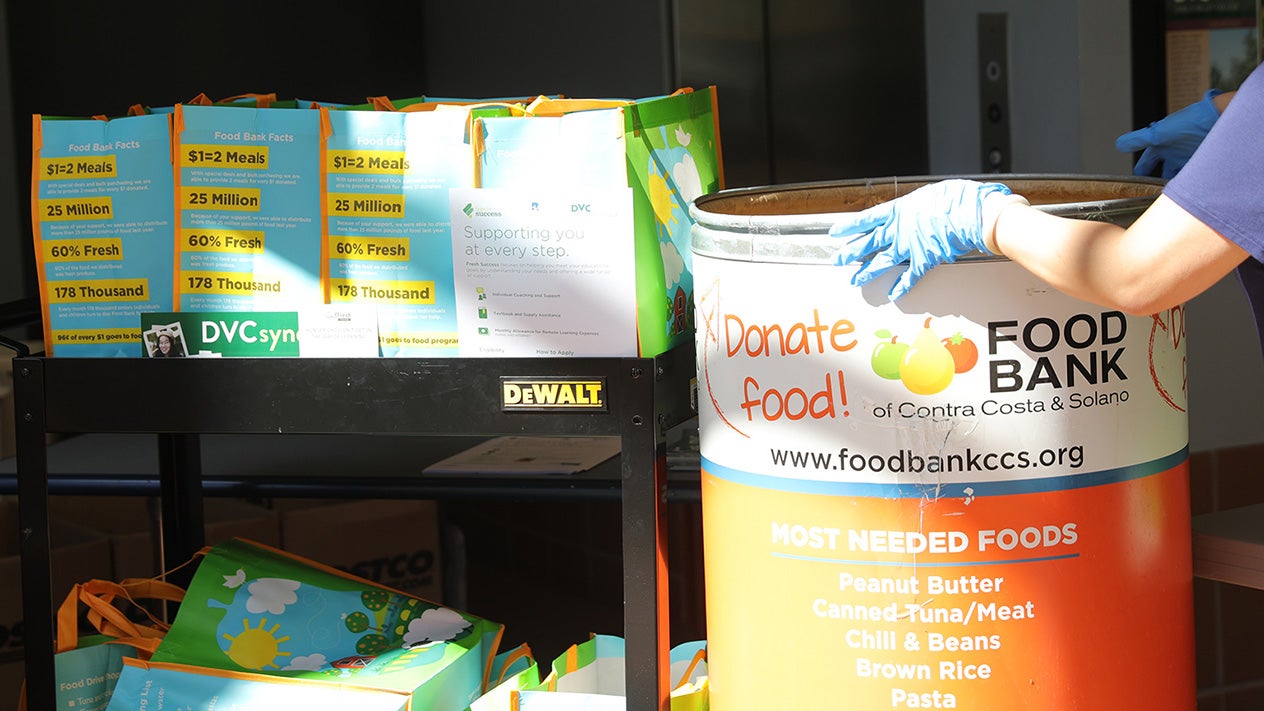 A volunteer works in DVC's food pantry.