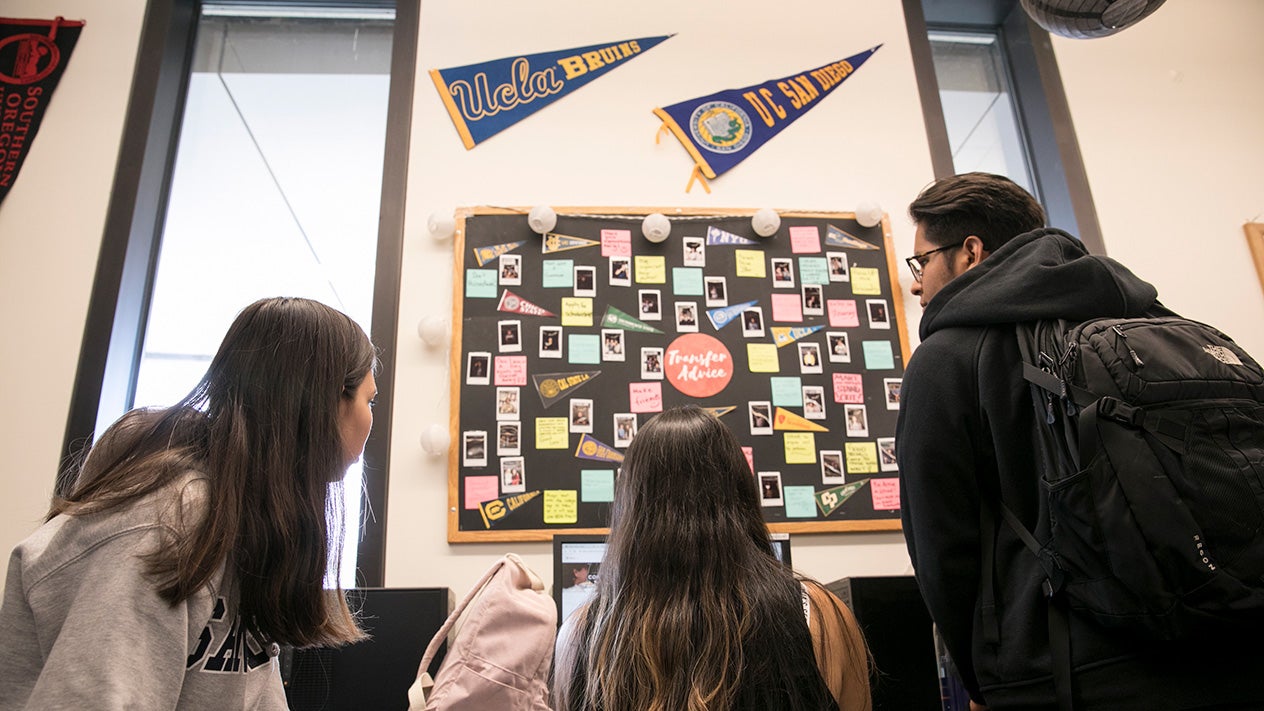 DVC students looking at transfer information in the DVC Career and Transfer Center