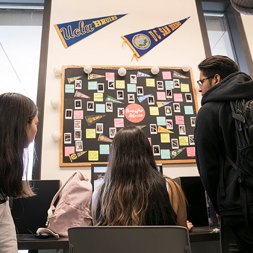 DVC students looking at transfer information in the DVC Career and Transfer Center