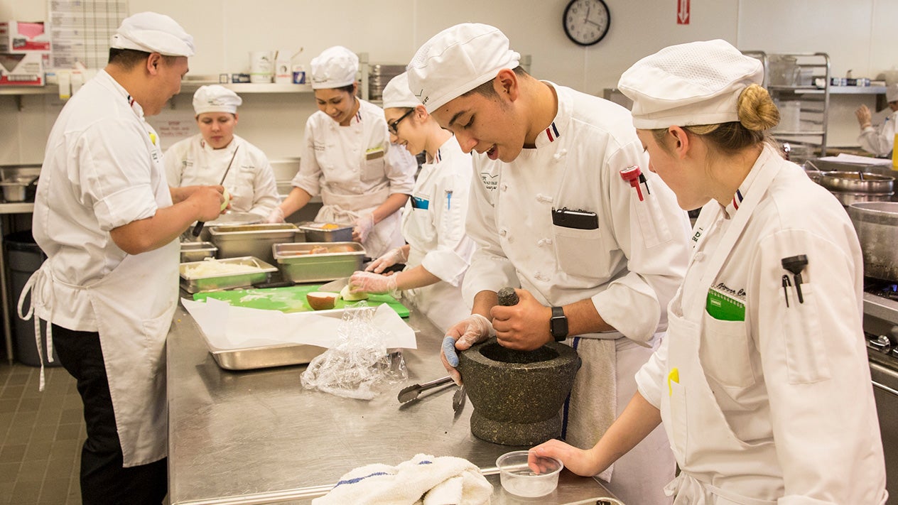 Culinary students in kitchen