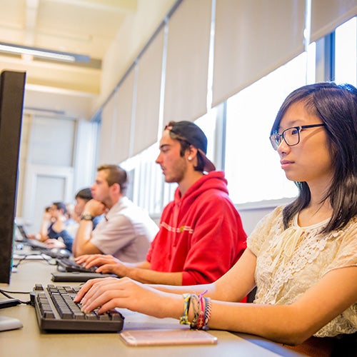 Students in a classroom working on computers