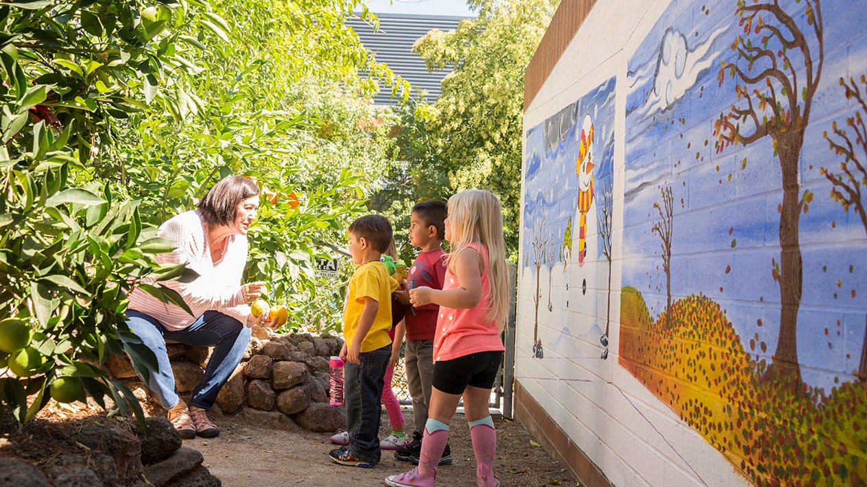 Teacher and children at Childrens Center