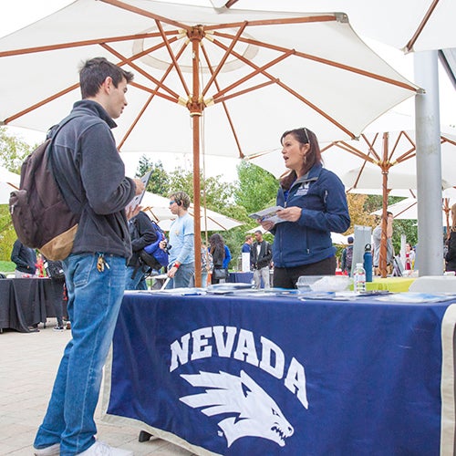 DVC students at a booth at an event on campus