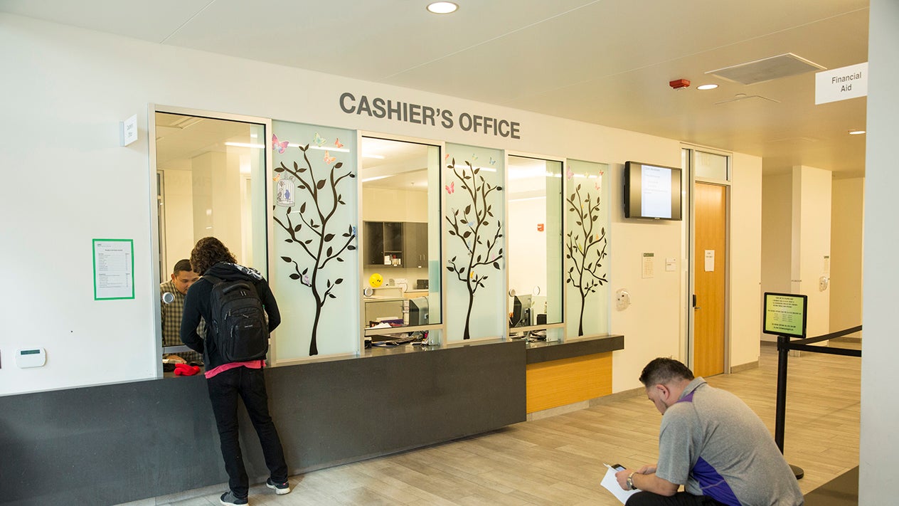 People waiting at cashier's office