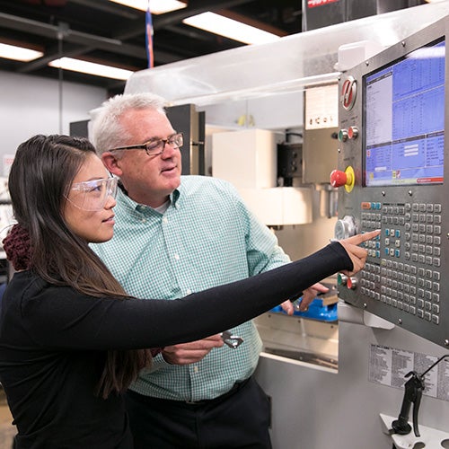 A DVC engineering student and faculty member in class.