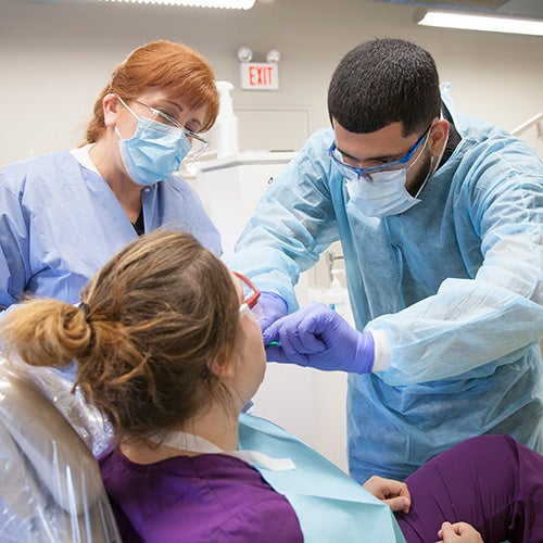 Dental Hygiene students and faculty in class.