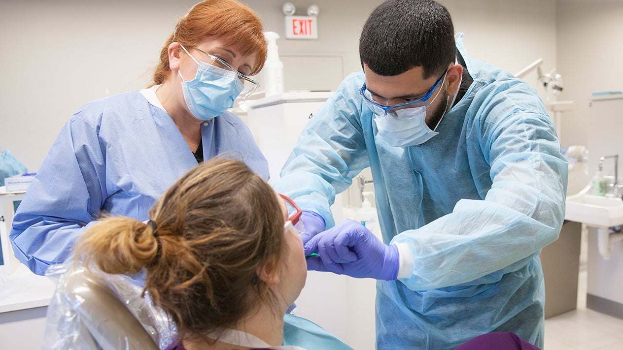 Dental Hygiene students and faculty in class.