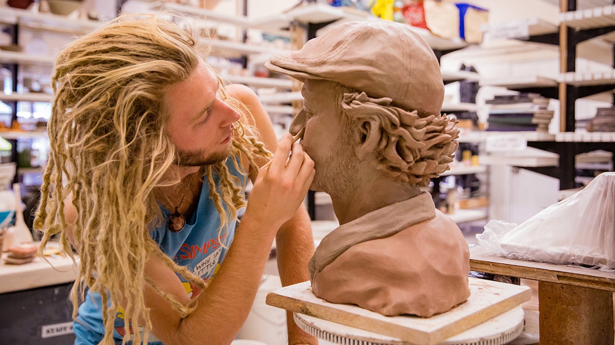 Sculpture student in DVC art studio