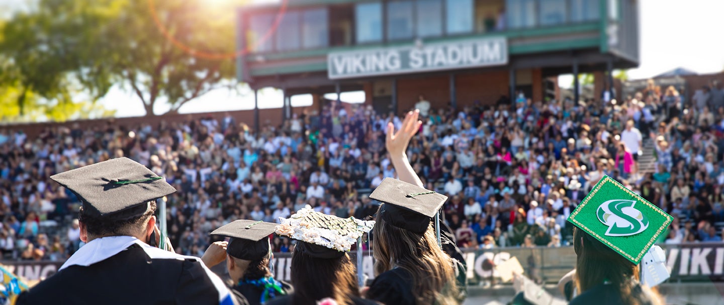 Waving graduates