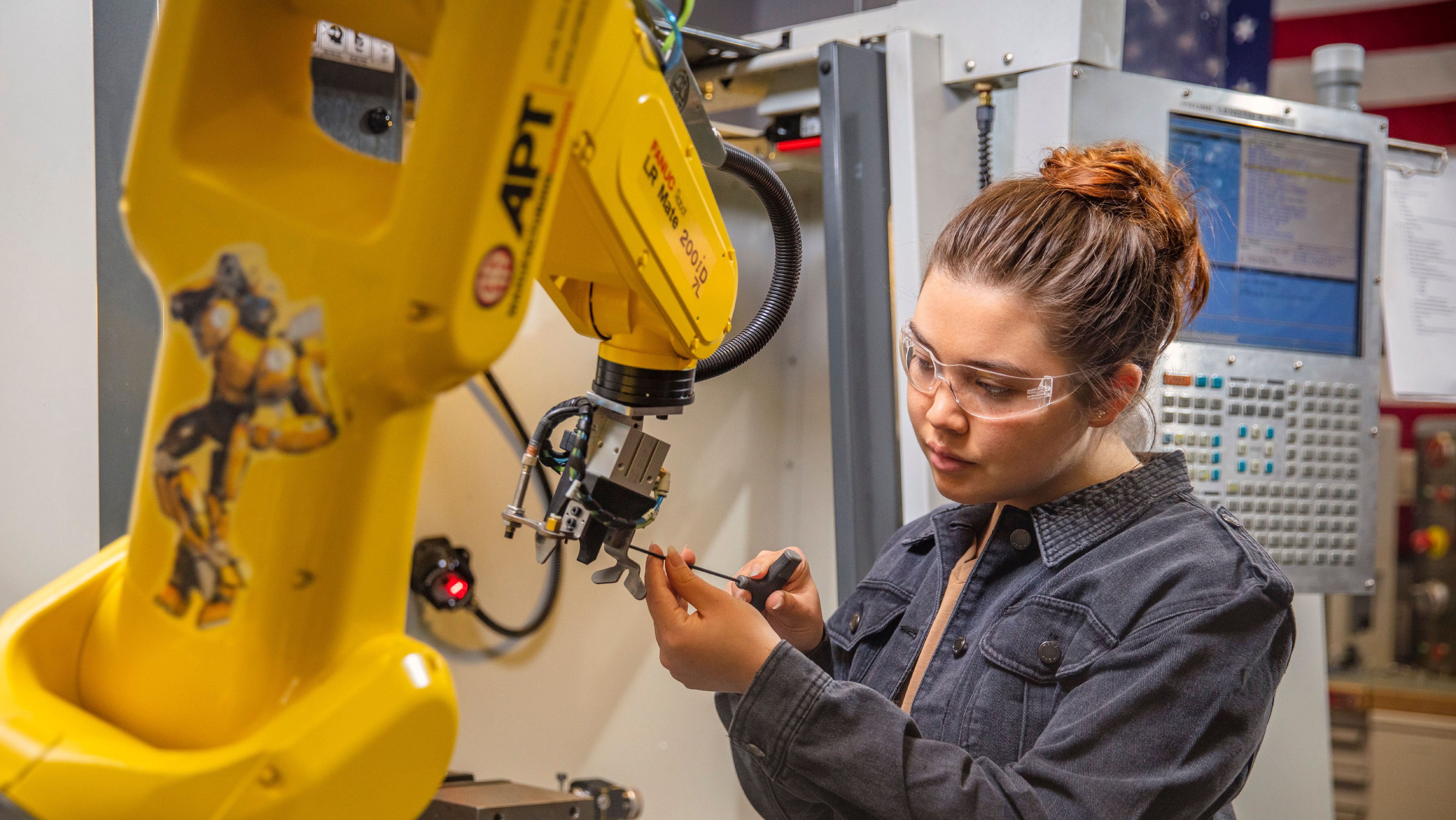 Engineering student working with robotics