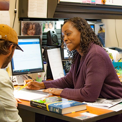 DVC student receiving assistance from a counselor