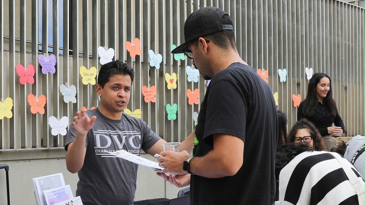 A DVC DREAMer gets help at a DREAMers Alliance event.