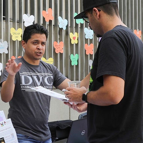 A DVC DREAMer gets help at a DREAMers Alliance event.