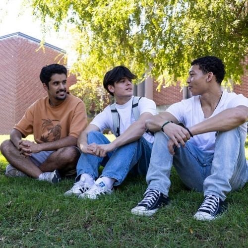 Three students talking