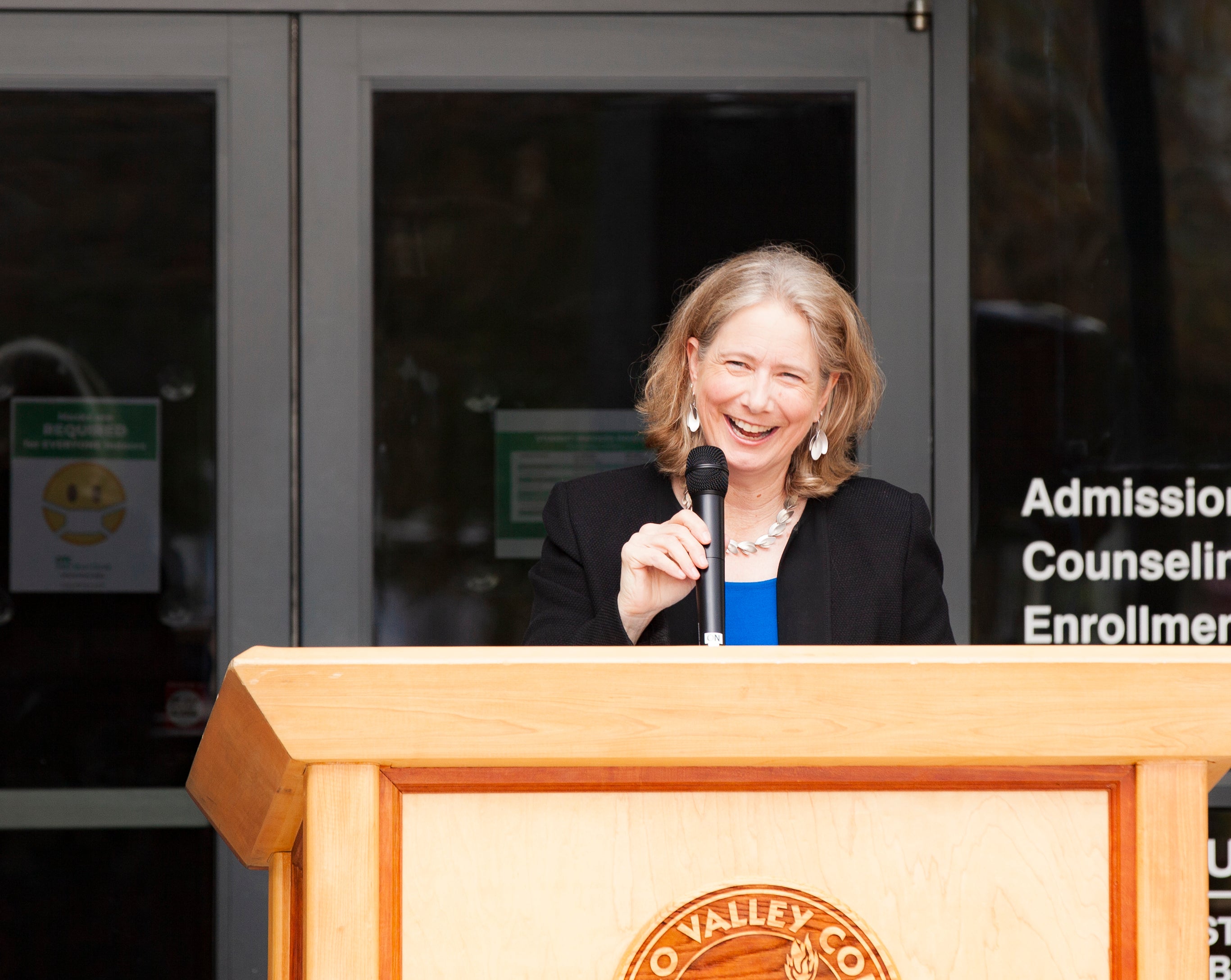 DVC President Susan Lamb speaking at a podium