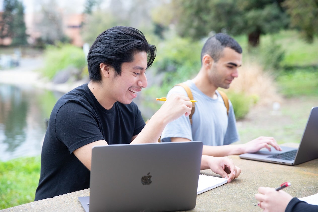 Students by DVC pond