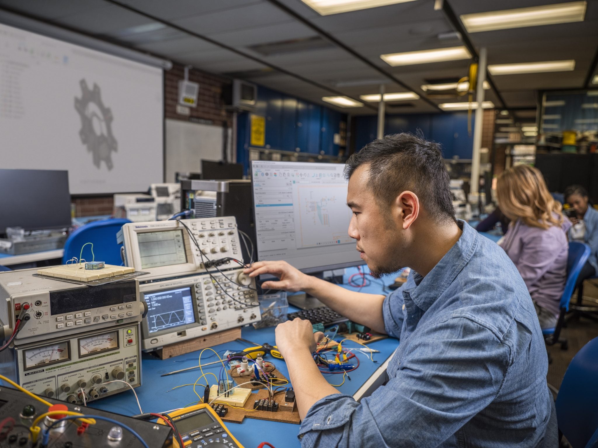 DVC electronics technology student working on a project