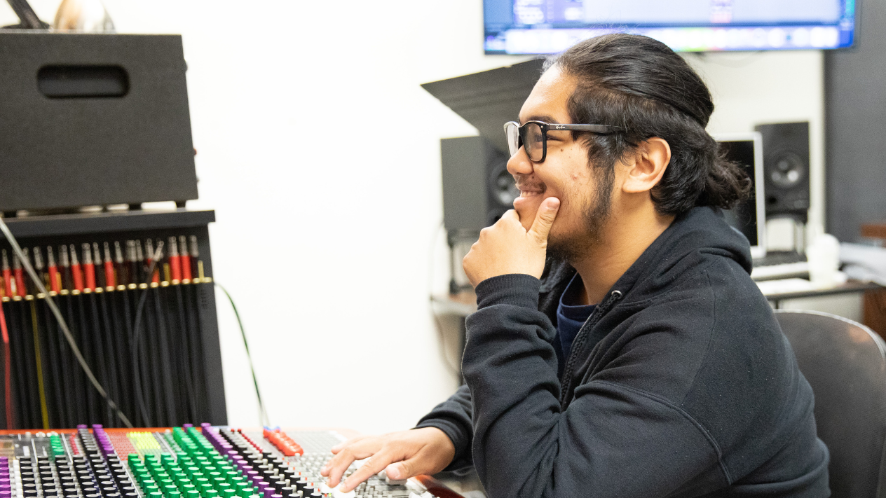 Student at mixing board