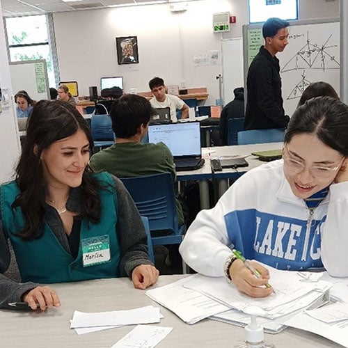 A tutor and student in the Math & Engineering Student Center.